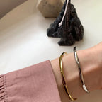 Golden Twist — Sterling Silver Bangle Bracelet