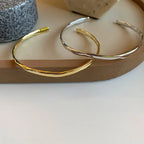 Golden Twist — Sterling Silver Bangle Bracelet