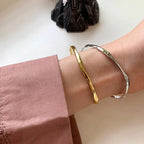 Golden Twist — Sterling Silver Bangle Bracelet